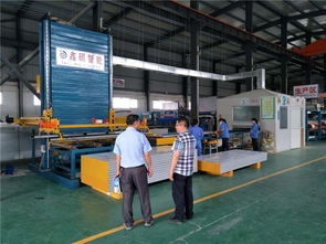 東莞三通板業碼垛機器人凈化板設備安裝完畢投入生產